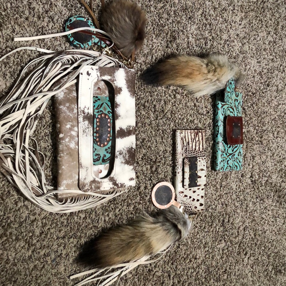 The lot of wallets and purses.